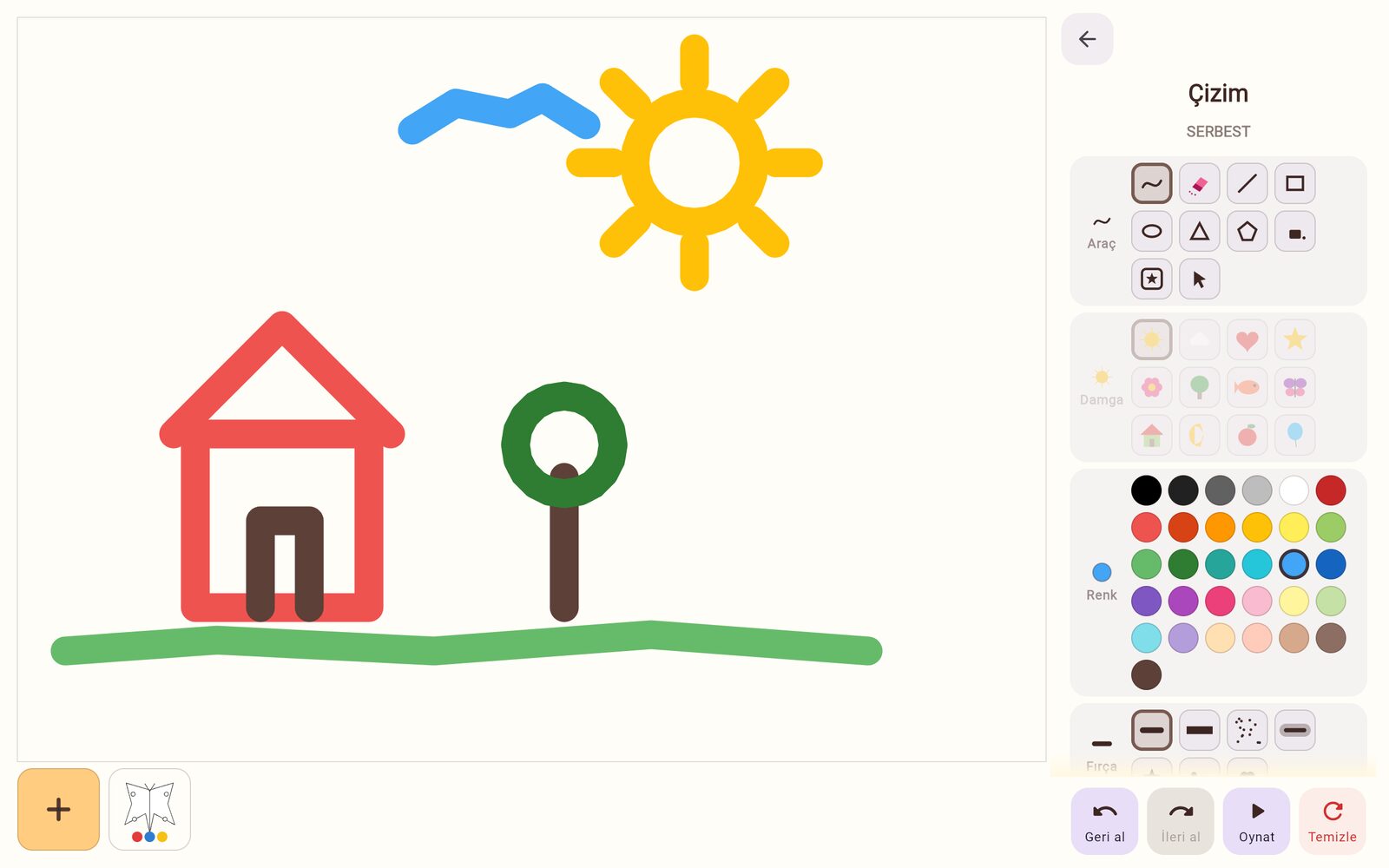 Drawing: a house, a tree and a sun on the canvas, with brushes, shapes, stamps and colours beside it