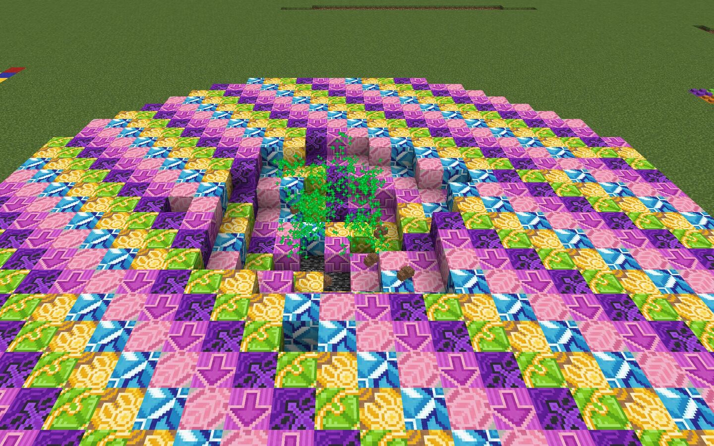 Sugar TNT: a dome of pink, purple and yellow candy blocks around the crater